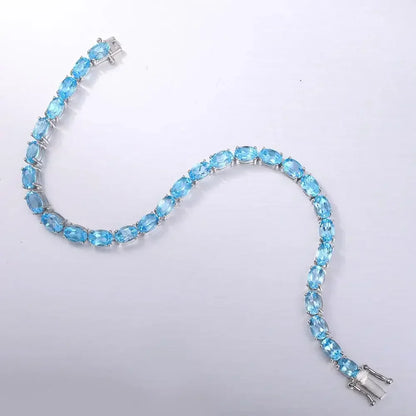 NATURAL SWISS BLUE TOPAZ OVAL RIVIERA - SWISS BLUE BRACELET